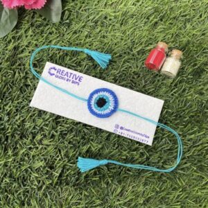 Handmade Crochet Evil Eye Rakhi | Eco-Friendly & Reusable Rakhi for Brother